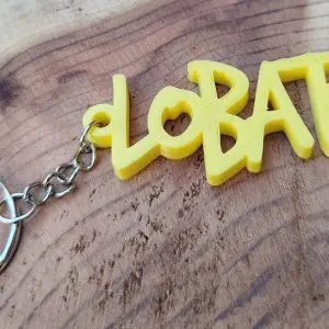 LLAVERO 3D LOBATOS TEXTO AMARILLO